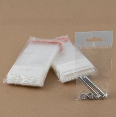 Sacchetti con chiusura adesiva e appendino espositore